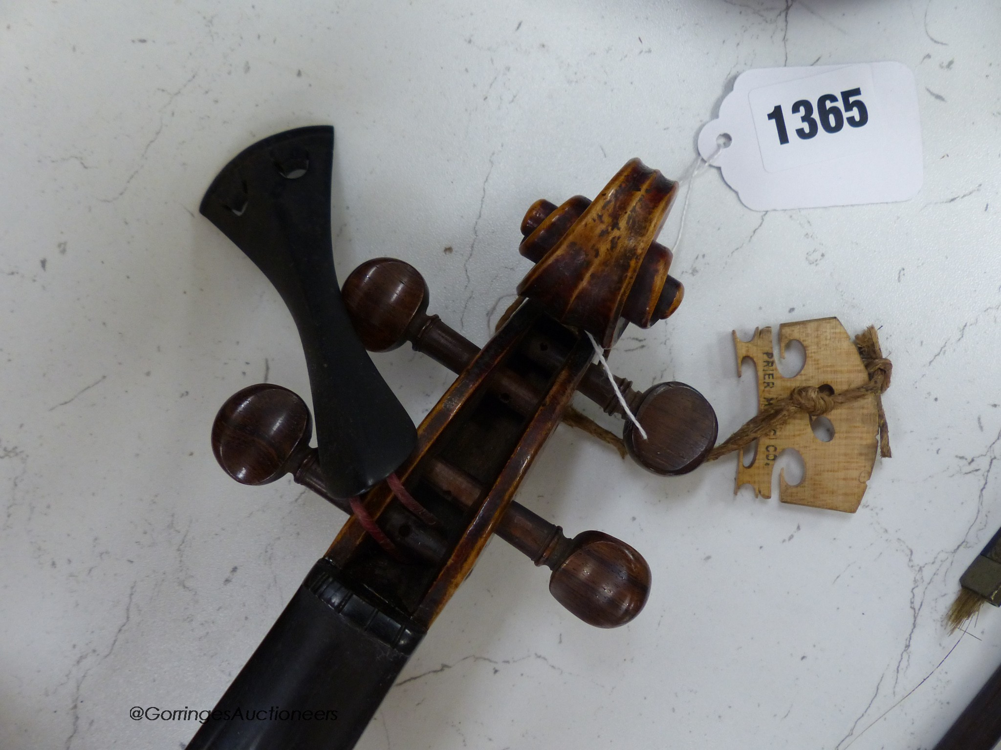 A Lowendall violin, labelled Stradivarius, 58cm long, together with a bow